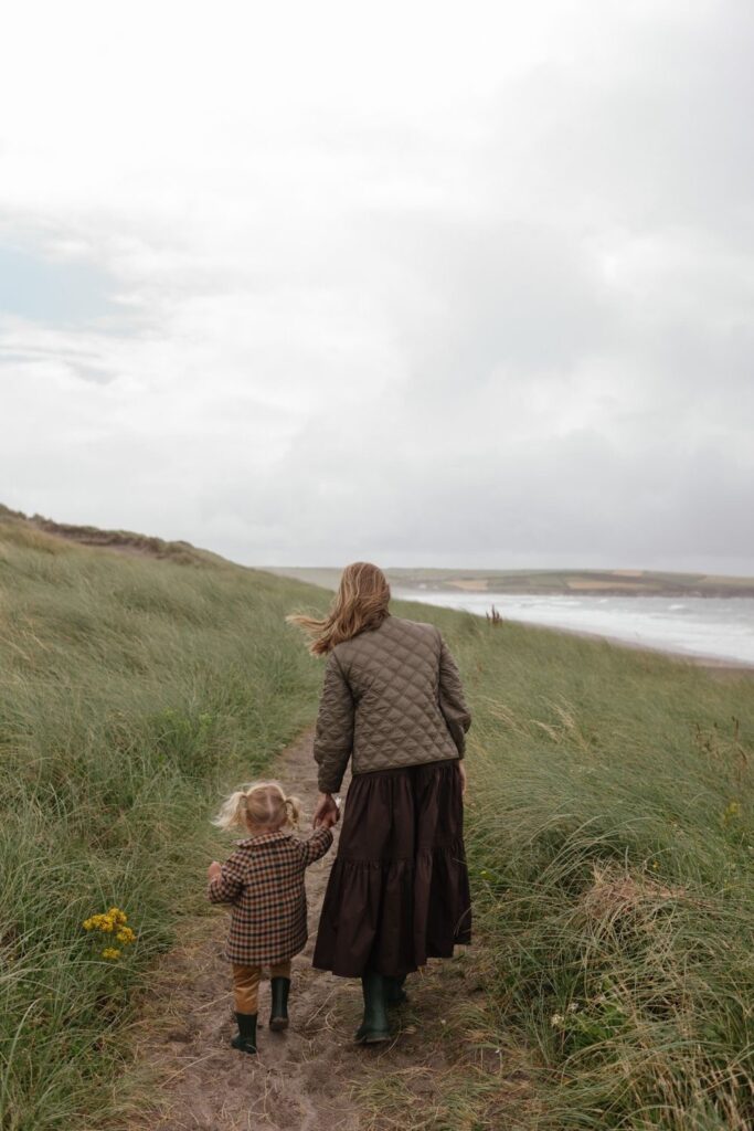 mom walking with kid