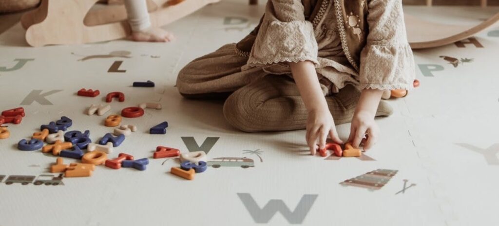 kid playing with blocks